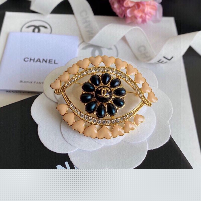 Ch*el brooches